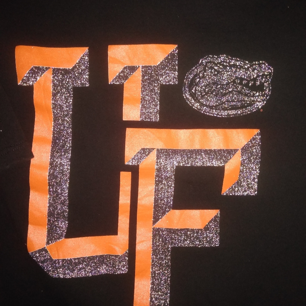 University of Florida Gators shirt.